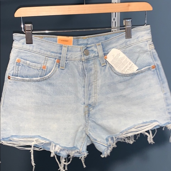 levi's 501 light wash distressed denim cutoff shorts